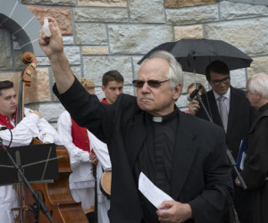 Reverend Phillip Pribonic blesses the St. Nicholas Historic site.