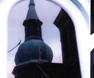 Church reflection through chapel window