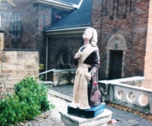 St. Bernadette gazing up at the Blessed Mother