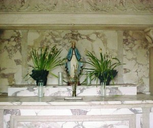 Marble altar inside grotto chapel donated by Mrs. John Crnkovic in memory of her son, Walter, who died in WWII