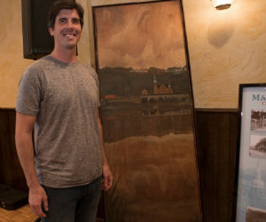 Young Artist, Cory Bonnet, displays his 2013 oil painting of St. Nicholas Church at the June 20 Dedication and Ribbon Cutting social at Javor Hall